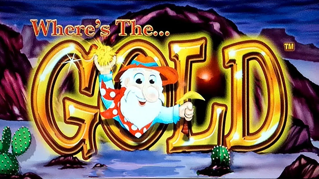 Where’s the Gold key art: the cartoon prospector holding a gold nugget and a pick inside the glowing GOLD logo, against a desert canyon at dusk